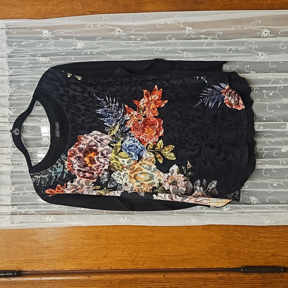 Lacy, sheer floral top